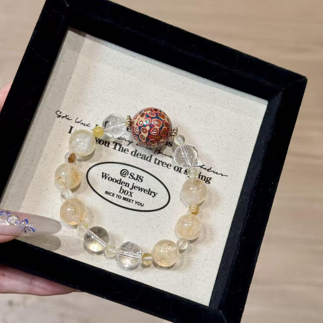 Fire quartz with lacquer bead