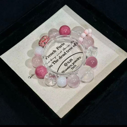 Lacquer bead with rose quartz with clear quartz