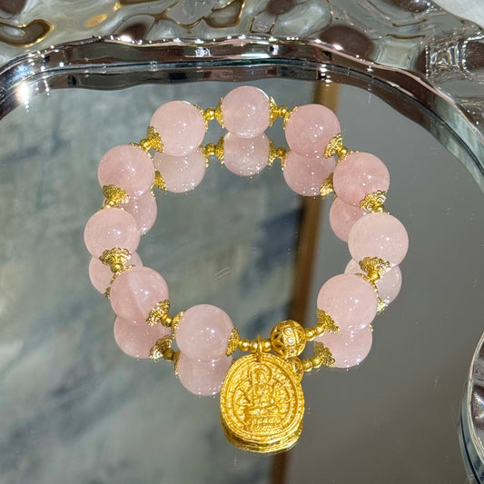 Rose quartz with buddha charm
