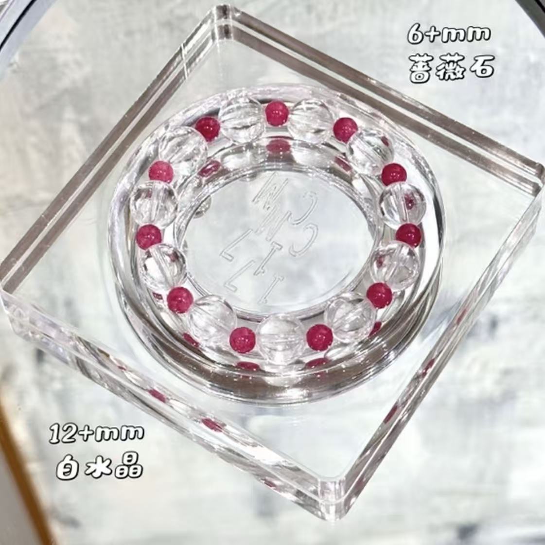 Clear quartz with Rhodonite