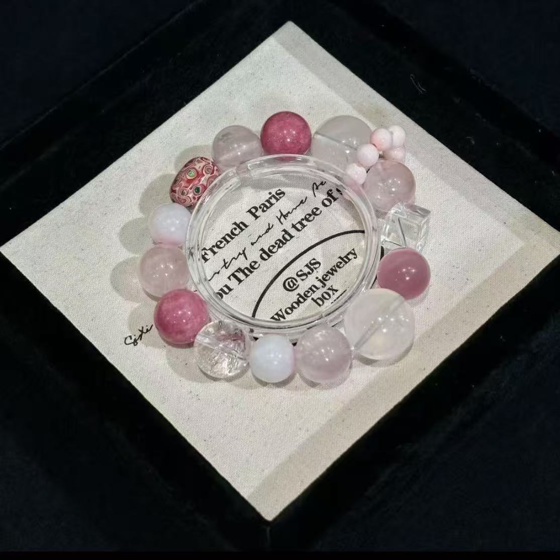Lacquer bead with rose quartz with clear quartz