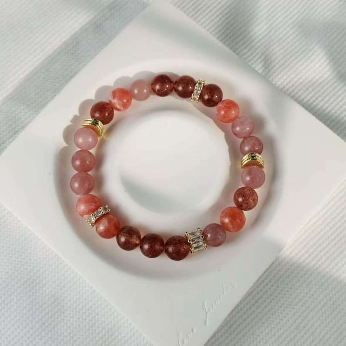 Rhodochrosite with straw berry quartz